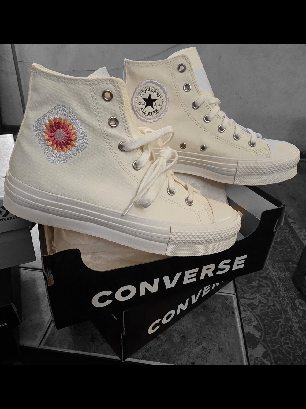 Converse Cream High-Top Sneakers with Colorful Embroidered Sunburst